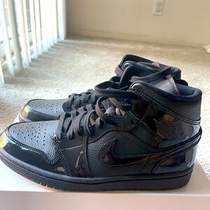 Women’s air Jordan 1 mid / triple black , New in box 9.5